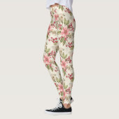 Roze, witte poinsettia's, groen en rode bessen leggings (Links)
