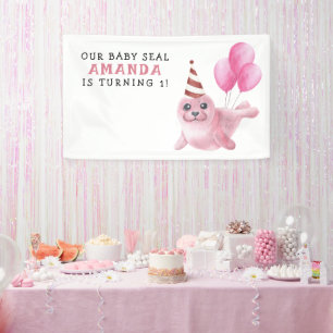 Roze zeehond 1e verjaardag onder de zee spandoek