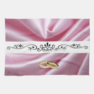 Roze zijde met een bruiloft theedoek