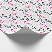 Roze, zwarte en grijze bril en as cadeaupapier (Hoek)