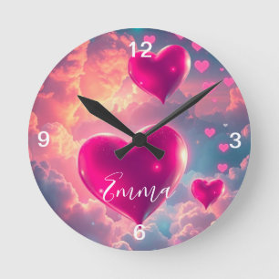 Roze zwevende harten in de lucht ronde klok