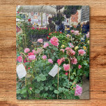 Rozen Legpuzzel<br><div class="desc">Deze puzzel bevat een foto van een kraam die roze rozen verkoopt op een markt in Frankrijk.</div>