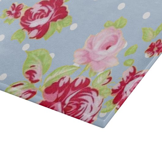 Rozen op blauwe glazen snijplanken (Hoek)