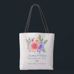 Rozen Waterverf Floral Wedding Tote Bag<br><div class="desc">Canvas tas met een fantastische florale bouquet met waterverf rozen. Stijlvol,  grillig en creatief. Een bundel rozen in roze,  paars en geel. Met veel sprigs en bladeren in groen,  roze,  paars en blauw. De achtergrond is een van-witte champagnekleur. 2 gouden trouwringen onder de tekst. Pas je trouwgegevens aan.</div>