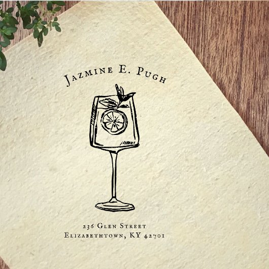 Rubberen stempel met retouradres in cocktailglas