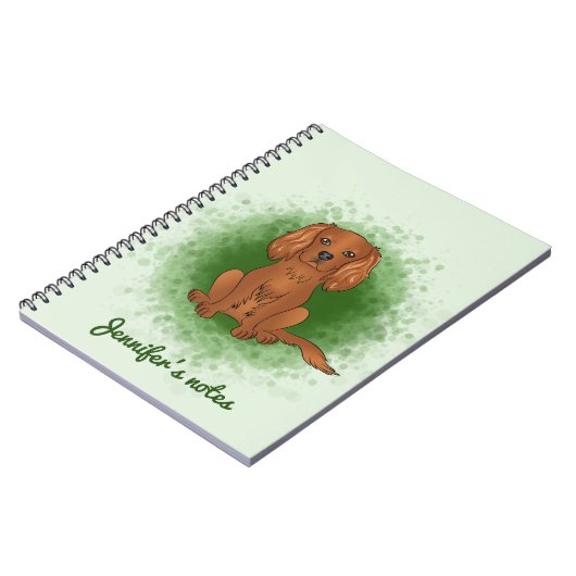 Ruby Cavalier King Charles Spaniel Dog over Groen Notitieboek (Linkerzijde)