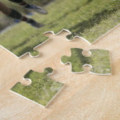 Rugby-speler die op de grond springt met bal legpuzzel (Zijkant)