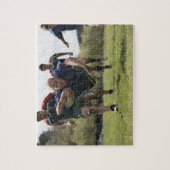 Rugby-speler die op de grond springt met bal legpuzzel (Verticaal)