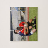 Rugby-spelers vechten voor bal legpuzzel (Verticaal)