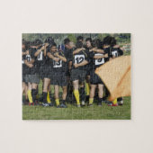 Rugby-team dat in een cirkel staat legpuzzel (Horizontaal)