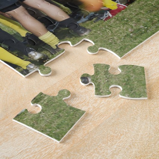 Rugby-team dat in een cirkel staat legpuzzel (Zijkant)