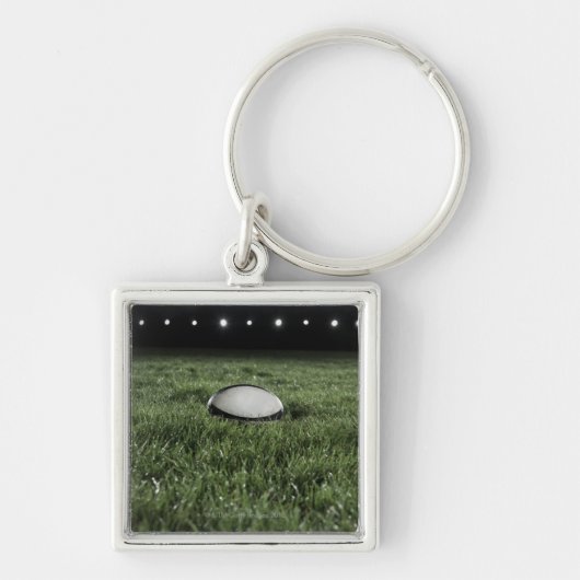 Rugbybal op het grasveld van een sleutelhanger (Voorkant)