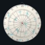 Ruimtetijdperk Turquoise Starbursts Dart Board Dartbord<br><div class="desc">Deze Space Age Turquoise Starbursts Dart Board-patroon bevat blauwe starbursts op een grillige achtergrond met gouden gekleurde spiegels. Dit ontwerp is geïnspireerd door een klassiek modern gerecht uit het midden van de eeuw en heeft een authentiek schilderij. De retro kitschy goedheid zal je het gevoel geven dat je over een...</div>