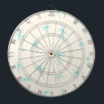 Ruimtetijdperk Turquoise Starbursts Dart Board Dartbord<br><div class="desc">Deze Space Age Turquoise Starbursts Dart Board-patroon bevat blauwe starbursts op een grillige achtergrond met gouden gekleurde spiegels. Dit ontwerp is geïnspireerd door een klassiek modern gerecht uit het midden van de eeuw en heeft een authentiek schilderij. De retro kitschy goedheid zal je het gevoel geven dat je over een...</div>