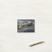 Ruimtevaartuigen die door een planeet vliegen post-it® notes (Op bureau)