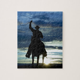 Ruitende zonsonderrug Riding cowboy silhouette Legpuzzel