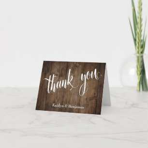 Rustbruin hout met elegante typografie bedankkaart