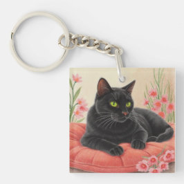 Rustende zwarte kat sleutelhanger