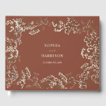 Rustic Baby's Breath Terracotta Wedding Gastenboek<br><div class="desc">Gypsophila-grensontwerp aan de voorkant boven de bruine achtergrond.</div>