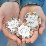 Rustic Bloom Bridesmaid Ronde Button 5,7 Cm<br><div class="desc">Identificeer de hoofdrolspelers op je vrijgezellenfeest of repetitief diner met onze elegante,  liefdevolle bloemknoppen. Button heeft een waterverf florale kreet van rozen,  pinda's en mums in rijke herfsttinten,  met "bridesmaïde" binnenin in handgeschreven letterschrift. Ontworpen om aan te sluiten bij ons Rustic Bloom-collectie.</div>