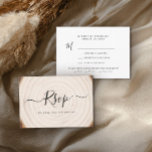 Rustic Tree Ring Wood Grain Wedding RSVP Kaartje<br><div class="desc">Set the tone for your rustic celebration with this wedding RSVP card featuring a soft wood grain tree ring background and elegant black script typography. The front showcases a large “RSVP” over subtle tree rings, while the back includes clean response lines for guest names, accept/regret options, and your reply-by date....</div>