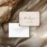Rustic Tree Ring Wood Script Calligraphy Wedding Bedankkaart<br><div class="desc">Send heartfelt gratitude with this rustic wedding thank-you card featuring a soft tree-ring wood background and elegant black script “thank you” on the front. Personalized names beneath the greeting add a warm, custom touch that coordinates with woodland, barn, and outdoor wedding themes. The back includes space for your message of...</div>