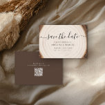 Rustic Tree Ring Wood with Wedding Website QR Code Save The Date<br><div class="desc">Announce your big day with this rustic save the date card featuring a natural wood ring background, modern calligraphy script, and clean serif names and date. The front highlights your wedding details over a soft tree-slice design, while the back showcases your wedding website and a scannable QR code so guests...</div>