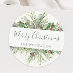 Rustic Winter Greenery Merry Kerstmis Ronde Sticker<br><div class="desc">Mooie envelopsluitklepjes met handbeschilderde botanische waterverf illustraties van wintergroene,  pijns- en sparsachtige takken,  keien en holbessen. Maakt een geweldige toevoeging aan kerstcadeaus of als vakantiekaartzegels.</div>