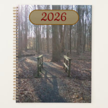 Rustic Wooden Bridge Amidst Tall Trees Planner