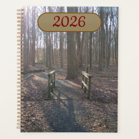 Rustic Wooden Bridge Amidst Tall Trees Planner (Voorkant)
