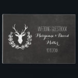 Rustic Wreath Deer Chalkboard Wedding Gastenboek<br><div class="desc">Het zwarte en witte trouwgastenboek met een nette look met het hoofd en de geweien van een dierbare binnenkant van een poot,  gedrukt om eruit te zien alsof ze in krijt zijn getekend op het bord. Personaliseer je naam en trouwdatum.</div>