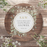 Rustiek hout monogram groen koppels douche papieren bordje<br><div class="desc">Met  snaarlampen en delicate waterverf groen bladeren op een rustieke houten achtergrond,  kunnen deze chique botanische douchepapieren borden worden gepersonaliseerd met uw monogram initialen en speciale douchedetails voor koppels. Ontworpen door Thisnotme</div>