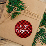 Rustiek Merry Christmas Script Red Plaid Ronde Sticker<br><div class="desc">Rustieke vakantie stickers met "Merry Christmas" weergegeven in een handgeschreven wit script met een rode geruite achtergrond. Personaliseer de rode geruite Kerst stickers met jouw naam of aangepaste tekst. Gebruik de rustieke Kerst stickers om enveloppen,  vakantiegiften en feestfeestartikelen te verzegelen.</div>