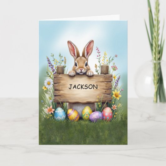 Rustiek teken konijn in gras met paaseieren kaart (Voorkant)