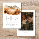 Rustieke Herfst Mountain Scene Waterverf Foto Save The Date<br><div class="desc">Ontsnap naar een serene herfst berg retraite met uw trouwfoto opslaan van de datum kaart. Dit prachtige ontwerp toont een adembenemend waterverf schilderij van een majestueuze berg, omringd door herfsten versierd met bladeren. De gedempte natuurlijke tinten van bruin, bruin, roest, goud en grijs creëer hebben een tijdloze en verfijnde sfeer,...</div>