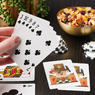 Rustieke Herfst vogelverschrikker met pompoenen en Pokerkaarten