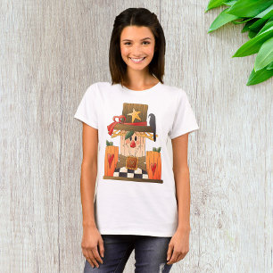 Rustieke Herfst vogelverschrikker met pompoenen en T-shirt