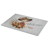 Rustieke herfstoogst vogelverschrikker met pompoen snijplank (Hoek)