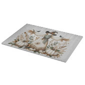 Rustieke herfstoogst vogelverschrikker met pompoen snijplank (Hoek)