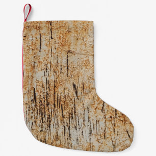 Rustieke kleuren verstrengelen in gecorrodeerde me kleine kerstsok