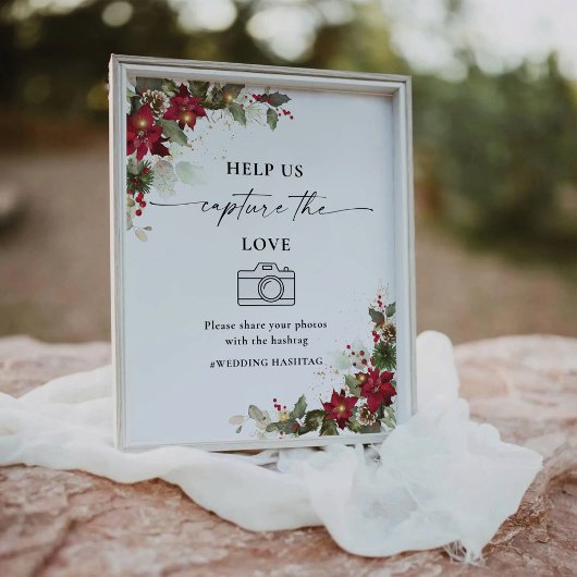 Rustieke poinsettia helpen ons het liefdesteken va reclamebord met voetstuk