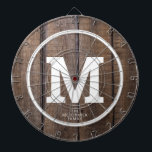 Rustieke schuur hout familie gepersonaliseerd mono dartbord<br><div class="desc">Speel een leuk spel van darts met deze rustieke schuur hout familie gepersonaliseerde Monogram dart board. Het is ontworpen met bruine faux houten achtergrond en uw grote witte vet monogram initiaal op het centrum. Ook het dartbord is gepersonaliseerd met familienaam onder de letter. Klik op sjabloon personaliseren en volg de...</div>