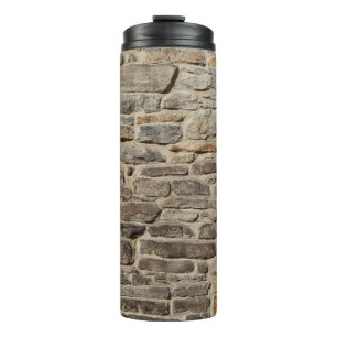 Rustieke stenen muur, getextureerde decor thermosbeker
