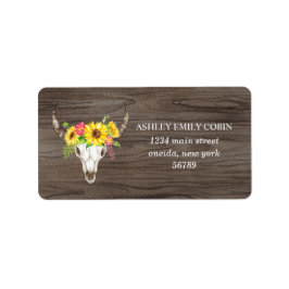 Rustieke stier schedel op donker hout met zonneblo etiket