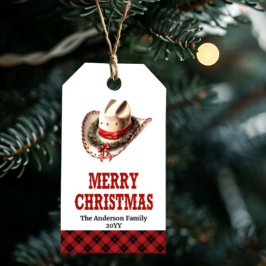 Rustieke westerse kerstcadeautag met cowboyhoed cadeaulabel
