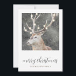 Rustieke Winter Stag String Lights Kerst Kaarten<br><div class="desc">Een serene winterhert in wintersneeuw met gloeiende snaarlampen op zijn gewei en vrolijk kerstfeest in een script lettertype. Een stijlvol modern rustiek wenskaart voor de feestdagen.</div>