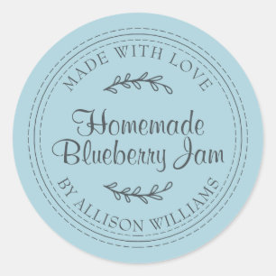 Rustieke zelfgemaakte bosbessenjam blikken blauwe  ronde sticker