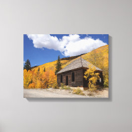 Rustige hut in het gouden bos canvas afdruk