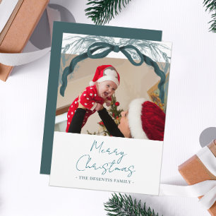 Rustige kerst foto met lint en groene krans feestdagenkaart