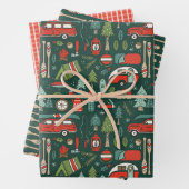 Rustige kerstkamperen en vissen inpakpapier vel (In situ)